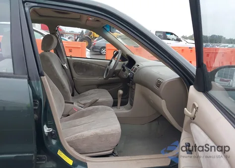 2000 Toyota Corolla Le from USA, damaged, VIN 1NXBR18E3YZ305285